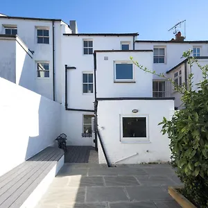 Vibrant Spring Street With Garden Brighton